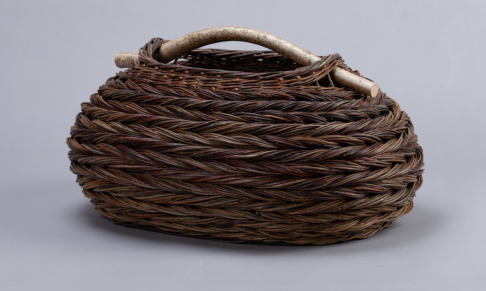 Large scale oval herringbone weave basket